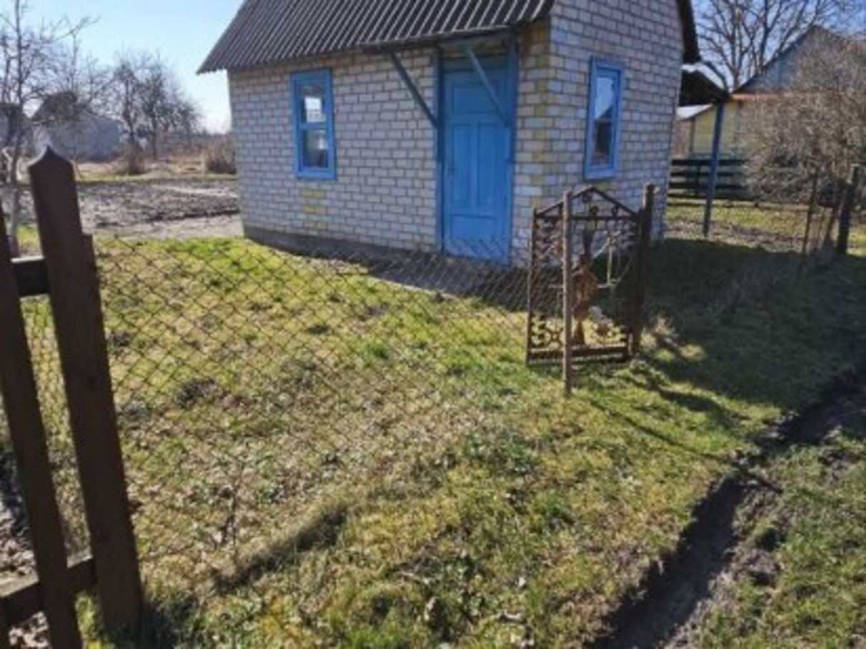 земельна ділянка із будинком