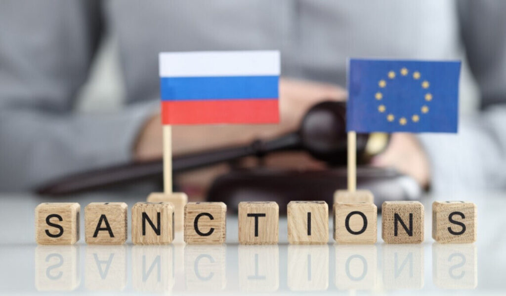 прапори ЄС та Росії