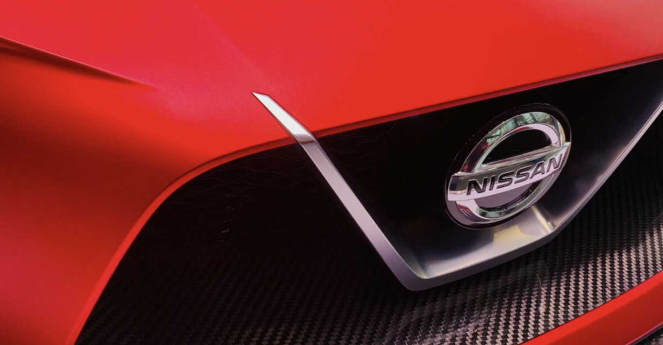 логотип Nissan